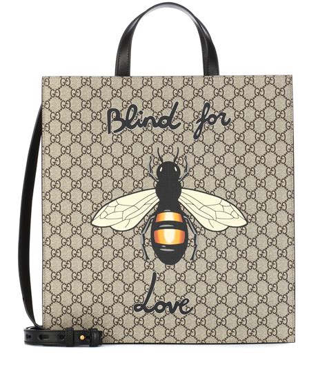 gucci bee print top|white Gucci bag.